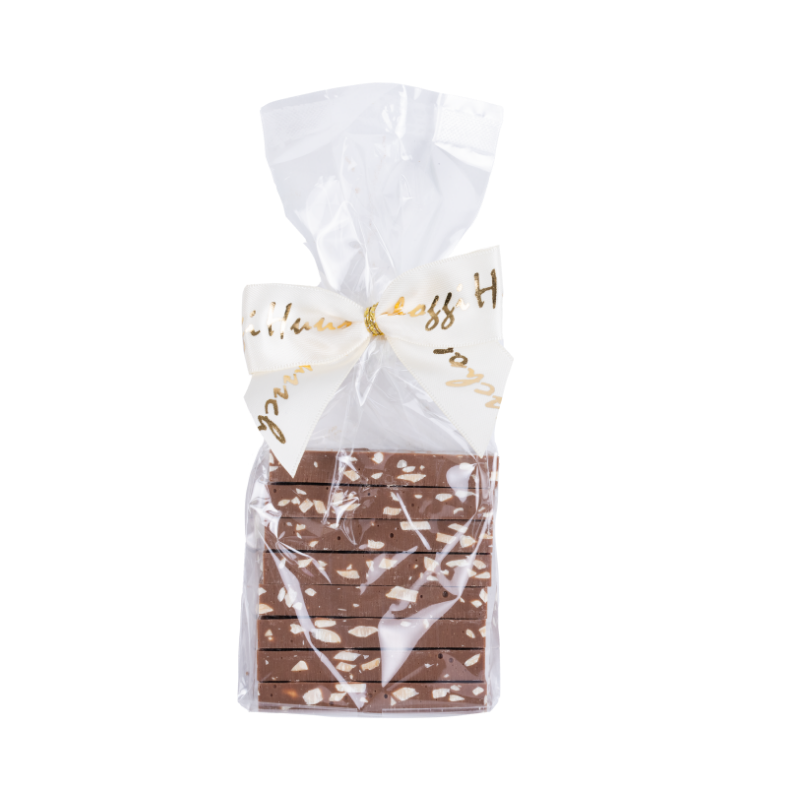 Huusschoggi im Säckli Milch mit Mandeln, Zimt & Apfel (150g) Huusschoggi im Säckli Milch mit Mandeln, Zimt & Apfel (150g)